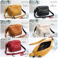 TAS bahan kulit jeruk FOSSIL Sling Bag