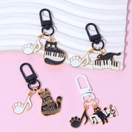 Exquisite Piano Cat Keychain Musical Symbol Kitty Paws Keyring Unisex Earphone Case Pendant Gifts