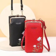 Women's crossbody and shoulder bag that doubles as a long hand-held wallet with 2 unique zipper comp