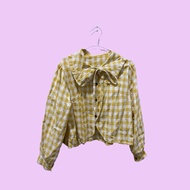 Yellow checkered blouse