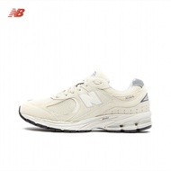 NEW BALANCE NB 2002RE รองเท้าวิ่งผู้ชายและผู้หญิงสีเบจอ่อน