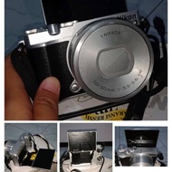 Nikon 1 J5 silver bekas lensa kit 10 - 30 mm FULL SET Bonus Tas Kamera