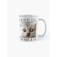 I'm not I'm here live I'm not meme cata Coffee Mug