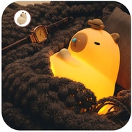 Đèn ngủ Capybara Chuột lang đội mõ đội quýt tu tâm tích đức sạc usb chất liệu Silicon mềm -h2t toys