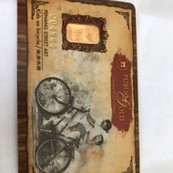 Public gold 0.5 gram kids on bicycles