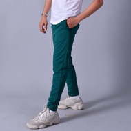 กางเกงลำลองขายาวแกรนด์สปอร์ตรหัสสินค้า : 024086 (สีเขียว)