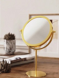 一面金色可旋轉的桌上圓鏡