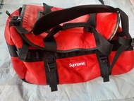 supreme x northface leather duffle bag red