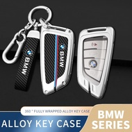 คาร์บอนไฟเบอร์หนังแท้ TPU &amp; สังกะสีอัลลอยสมาร์ทกุญแจรถรีโมทปลอกใส่กุญแจรถปลอกป้องกันพวงกุญแจที่มีสไตล์การป้องกันสำหรับ BMW 1 2 3 5 6 7ชุด X1 X2 X3 X5 X6 F16 F10 F20 F40 F26 F48 F21 f85 F39 F25 F22 F30 F31 F32 G01 G20 G30