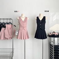 24-111108 Women's Suits. Women's Small Vest Top and Pleated Short Skirt