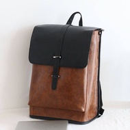 กระเป๋าสะพายหลังหนังแท้ธรรมดาใหม่ของ Joy มีดีไซน์ที่เรียบง่ายและทันสมัยในสีทึบและสามารถสวมใส่ได้ทั้ง