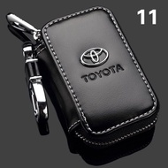 Nuoke 1ชิ้นกระเป๋าสตังค์พวงกุญแจรถยนต์สำหรับ Toyota Hyundai เคสกุญแจหนังแท้รีโมทคอนโทรล Nissan