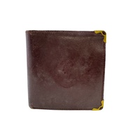 Pre-owned CARTIER Must Line embossed logo bifold wallet with coin purse and bill compartment in RED.