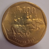 uang koin 100 rupiah kuning