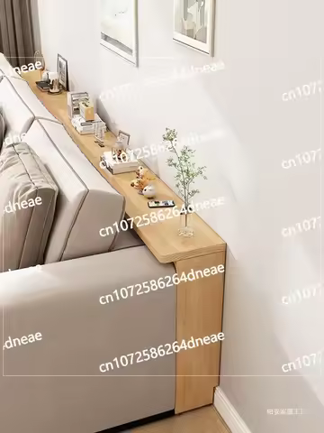 Storage rack behind the sofa, narrow against the wall behind door, bookshelf on the ground, extremel