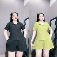 Set of women's big-size short-sleeved shirt with turn-down collar and wide-leg pants with elastic wa