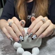 Hand-covered nails, Nailbox designed with black background and silver mirror finish and unique motif