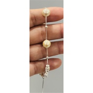 Pearl bracelet mixed with 4-leaf clover charm with colored stones