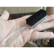 Transparent Fade Hair Brush Cleans Hair.