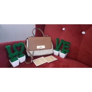 Preloved MK signature sling bag