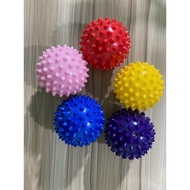 Hard spike ball for physical therapy