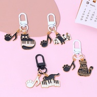 Lovely Musical Symbol Cat Paws Keychain Black White Piano Kitty Keyring Unisex Backpack Pendant