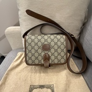 Gucci 老花風琴包