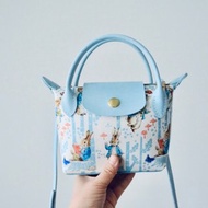 看書 吃胡蘿卜的藍色系彼得兔 迷你龍驤包