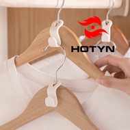 Plastic hangers attached to clothes hangers and hanger accessories help store and save space