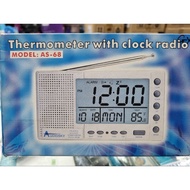 THERMOMETER  WITH CLOCK  RADIO