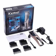 kemei ปัตตาเลี่ยนตัดผมไร้สายปัตตาเลี่ยนกันขอบของแท้ 100% รุ่น KM-5018 ปัตตาเลี่ยนตัดผมไร้สายปัตตาเลี่ยนตัดผมใช้งานทนทานมาตรฐานUSAมีฟันรองตัดง่ายปรับฟันได้กำลังเครื่องแรงร้อนช้ามีอะไหล่เปลี่ยนdon