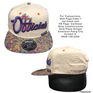 NWOT Official Men’s Snapback hat with a beige crown and a purple paisley-patterned brim C 0082