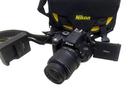 Nikon D5100 with 18-55mm lens (used ) very good condition
