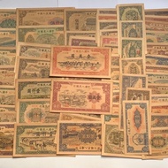 The first set of RMB 60 new banknotes contains the collection of four kings.第一套人民纸币全套60张全新纸币含四大天王收藏册