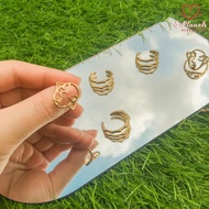 8Planets gold ring with artistic face motif