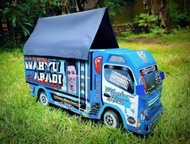 PROMOO MAINAN ANAK TRUK OLENG KAYU WAHYU ABADI DI LENGKAPI LAMPU TERPAL DAN REMOTE CONTROL TERLARIS