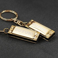 Suzuki Harmonica mini 5 lỗ 10 giai điệu Keychain Keychain Key của C Golden Woodwind Cụ Màu sắc: Golden