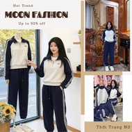 Women's autumn-winter tracksuit in navy gray color is a extremely hot model with a dynamic youthful 