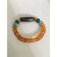 Dzi (Green 9 eyes) with Yellow Amber