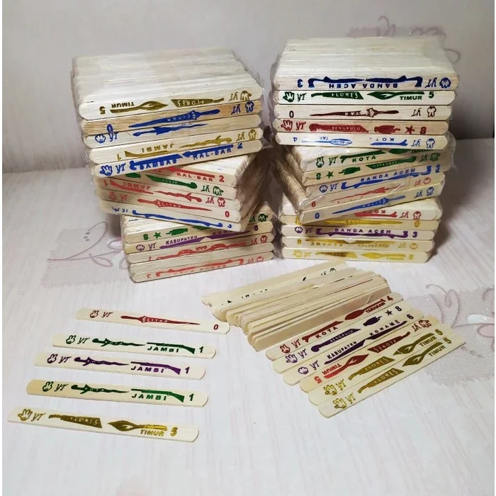 Mainan stik eskrim gambar warna emas isi 55 pcs Mainan stik es krim