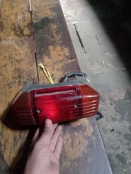 stopan lampu belakang copotan motor Suzuki rc100 bravo original