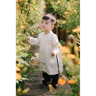 Boys' white ao dai with black pants