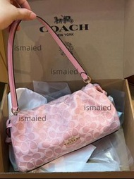 Coach 粉丹寧雲朵斜挎腋下包
