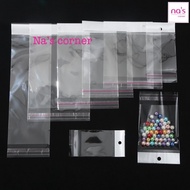 100 Túi kiếng trong dán miệng keo có lỗ treo Túi bóng kính nilon opp có miếng màng ngọc treo lên