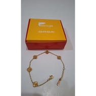 Beluga orca titanium van cleef gold bracelet