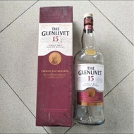Used empty glass bottle of The Glenlivet 15 1000 ml