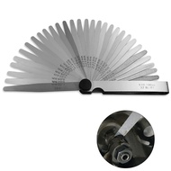 My_Set of 32 stainless steel feeler gauges, measuring from 0.001 to 0.04 inches (0.03 to 1.00 mm).