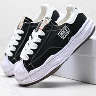 2025 New 【Original】 MMY Canvas บุคลิกภาพแฟชั่นแนวโน้มชายและหญิงรองเท้าลำลองส้นเตี้ยนักเรียนคู่รองเท้