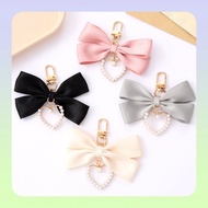 Chanel Style Pearl Heart Bowknot Phone Pendant Unique Versatile Bag Charm Decoration Keychain Pendan