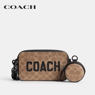 COACH กระเป๋าสะพายข้างผู้ชายรุ่น Charter Slim Crossbody In Signature Canvas With Coach Graphic CZ008